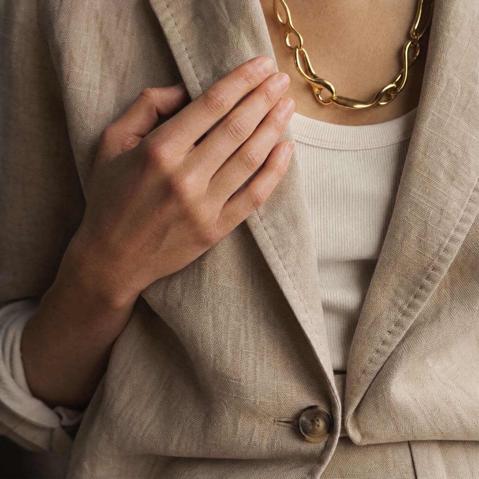 Button and necklace detail