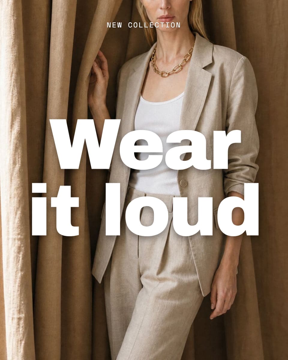 Wear it loud in large white type across a model in a beige suit