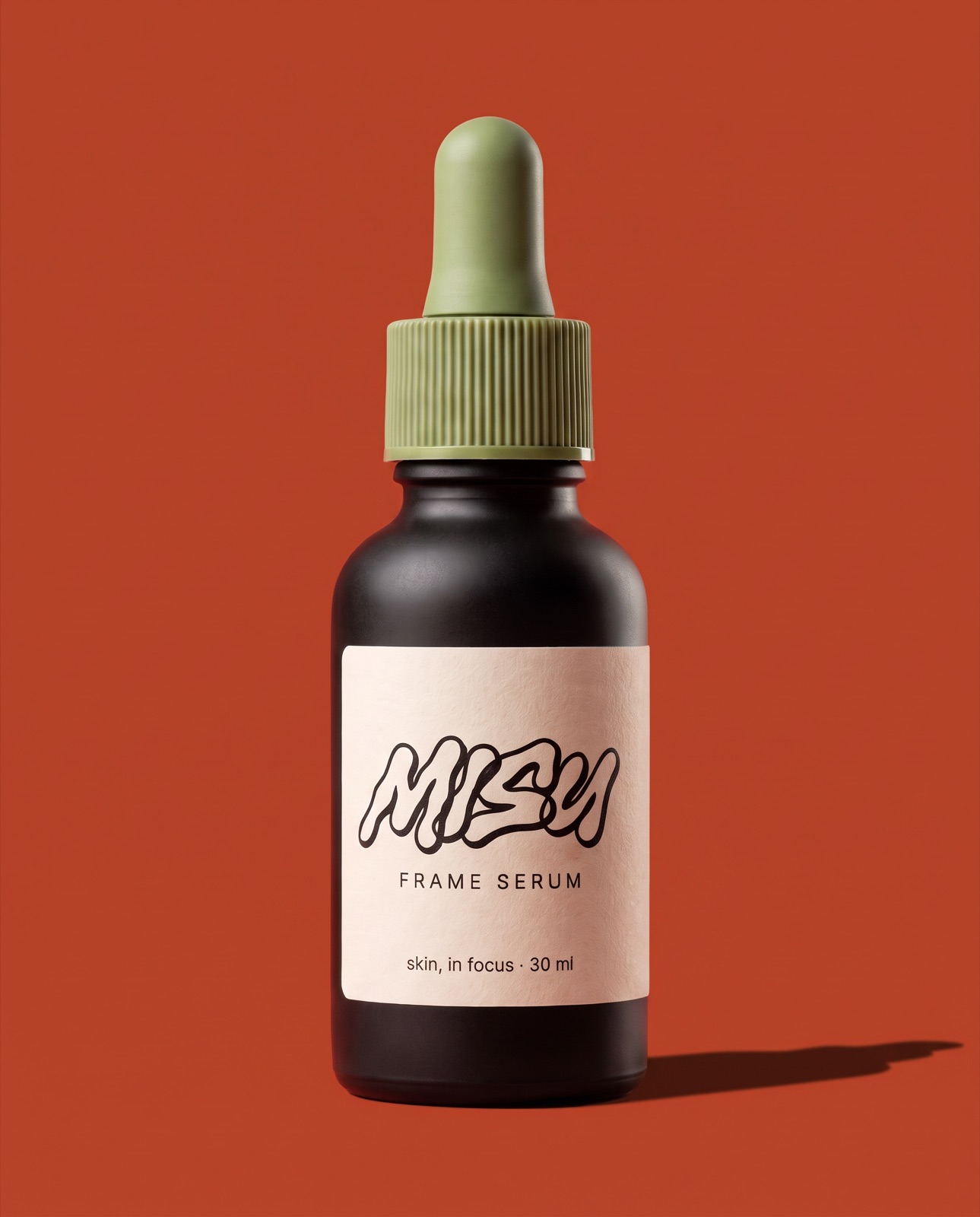 A serum bottle on red